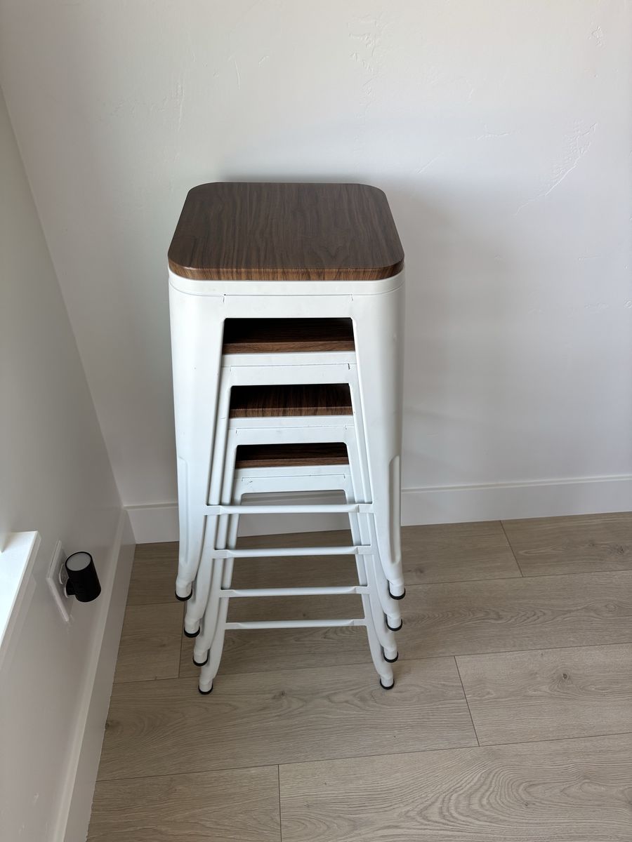 Set of 4 White Metal Stackable Bar Stools with Wood Seats