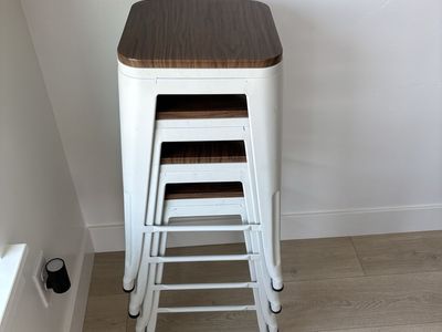 Set of 4 White Metal Stackable Bar Stools with Wood Seats