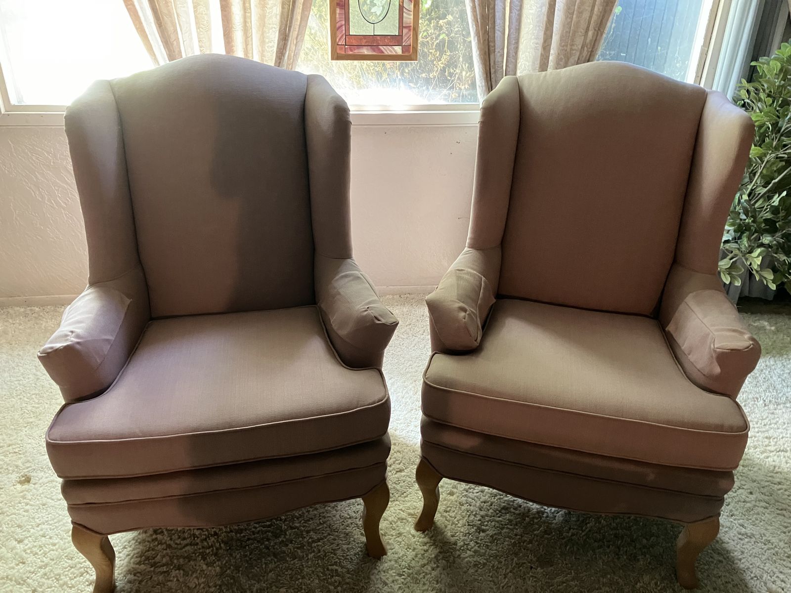 Two light pink mauve arm chairs