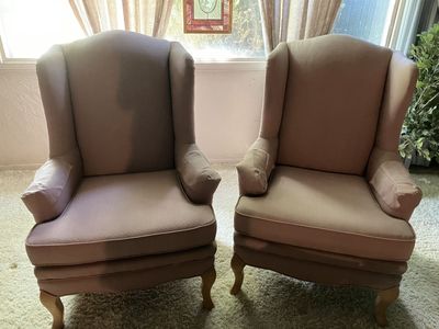 Two light pink mauve arm chairs