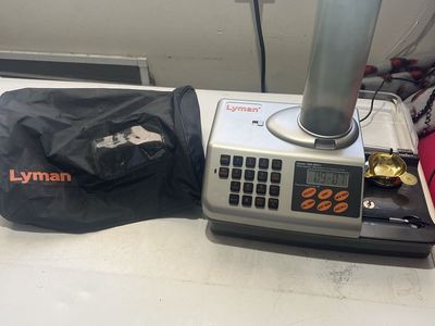 Lyman powder dispenser, and scale