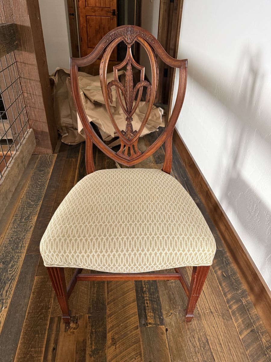 Antique reproduction Shield Back Dining Chairs and table with matching break front. Carved Wood mahogany