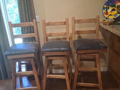 Set of 3 Wood Bar Stools with Black Padded Swivel Seats - Ladder Back Design