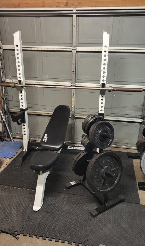 Bench and 260 pounds of weights 