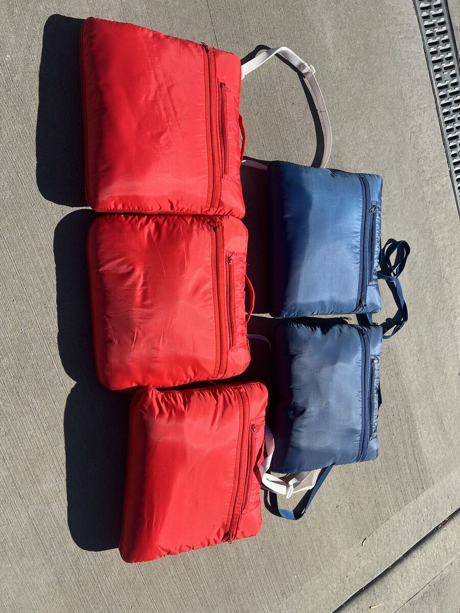 3 red, 2 blue wearable stadium blankets with hoods