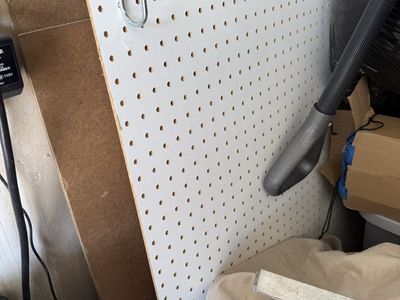 Assorted Lumber, Wood Planks, and Pegboard Panels for DIY Projects