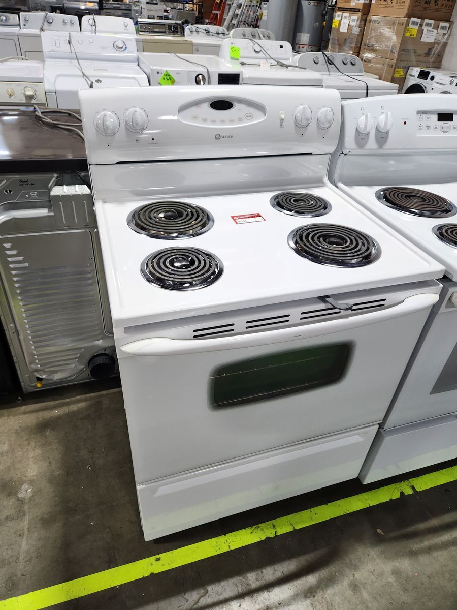 NICE MAYTAG COIL TOP RANGE! WITH A FULL WARRANTY