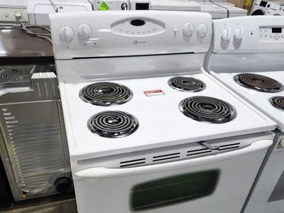 NICE MAYTAG COIL TOP RANGE! WITH A FULL WARRANTY