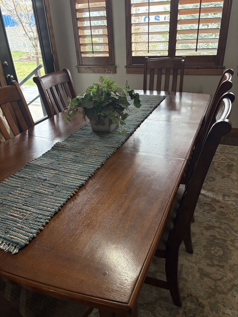 Dining Table And Cushioned Chairs