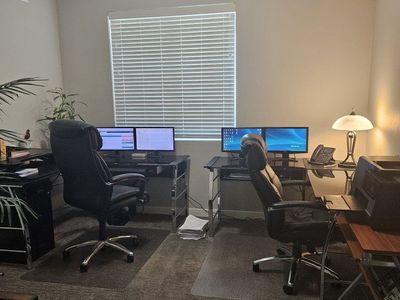 2 x Corner Office Smoke glass table, 2 x Black Leather Executive Office Chairs with High Back and 2x H.D. carpet protector.