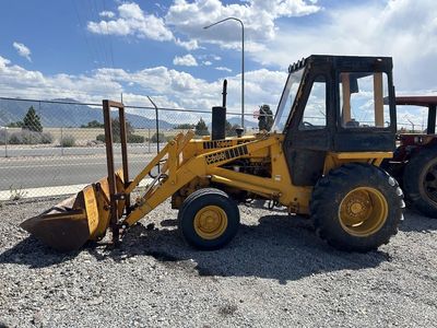 Case 580B Tractor with Loader & Hay Spears