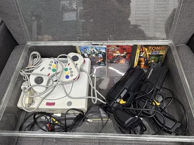 Sega Saturn Console Bundle with Controllers, Light Guns, and Games