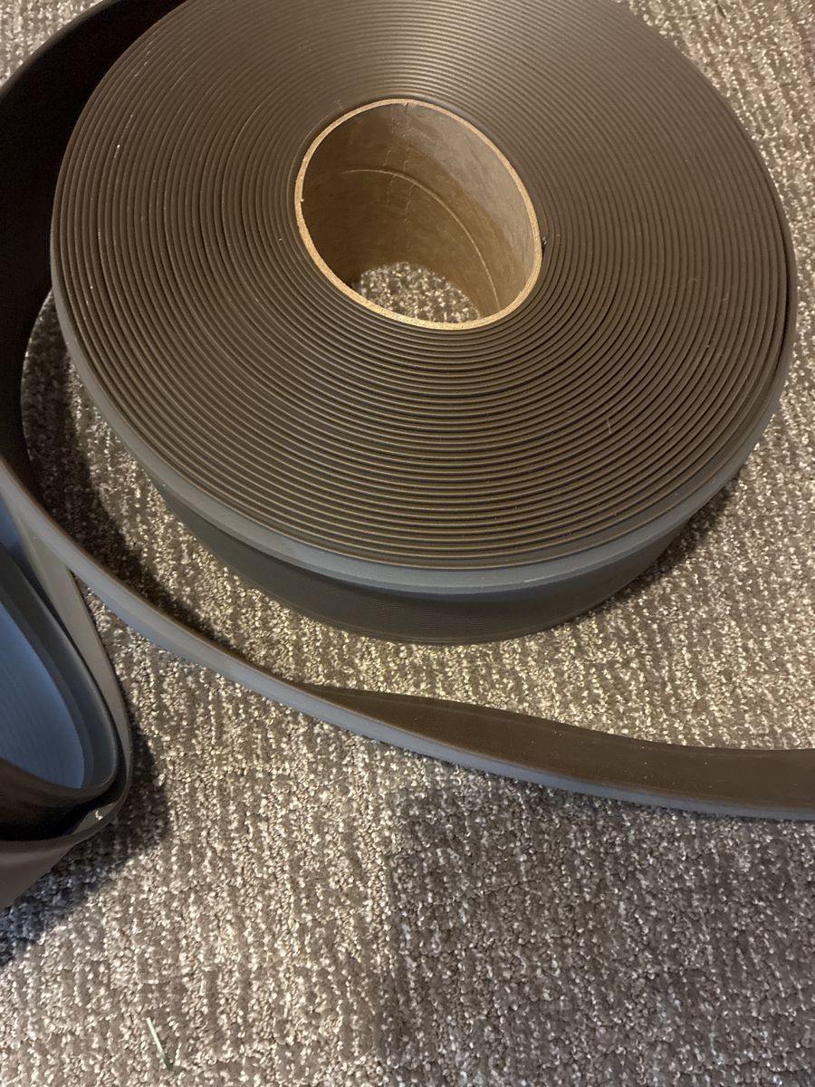 Unbranded Brown Rubber Weather Stripping Seal Tape Roll / brand new baseboard
