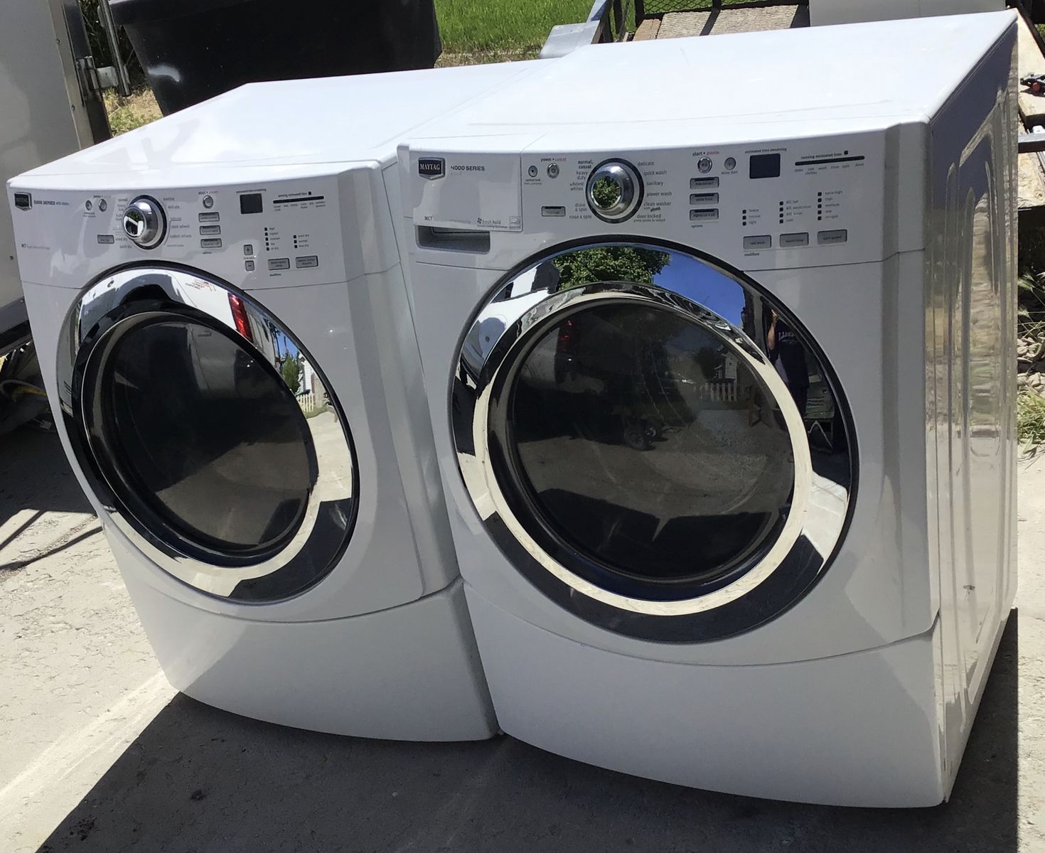 BEAUTIFUL SUPER CAPACITY MAYTAG STACKABLE SIDE BY SIDE FRONT LOAD SET. INCLUDES FREE DELIVERY