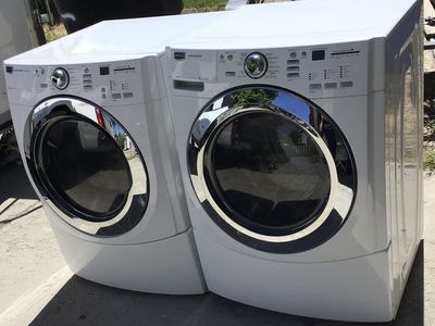 BEAUTIFUL SUPER CAPACITY MAYTAG STACKABLE SIDE BY SIDE FRONT LOAD SET. INCLUDES FREE DELIVERY