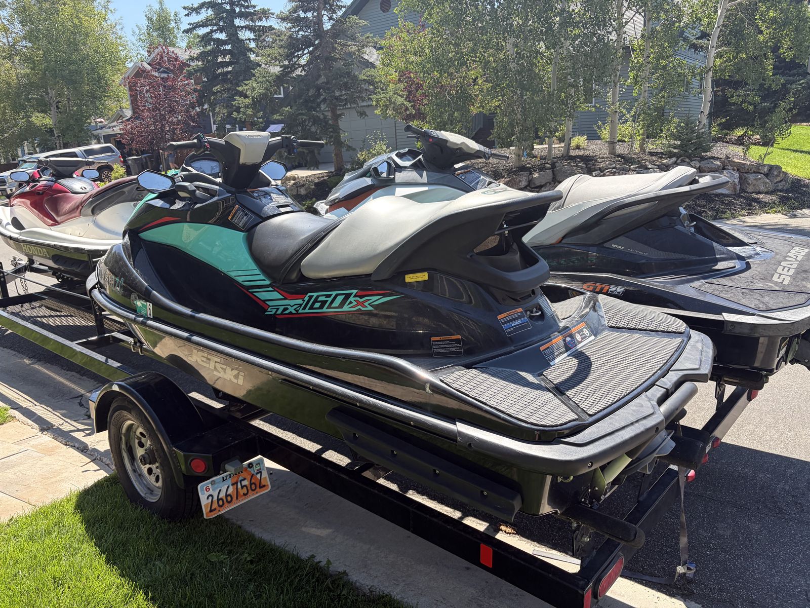 Three 4 stroke Jet Skis for Sale w/ Newer 3 Place trailer 