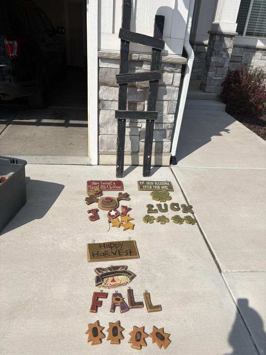 Decorative porch ladder with holiday inserts 