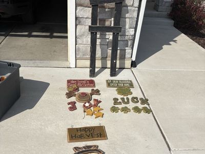 Decorative porch ladder with holiday inserts