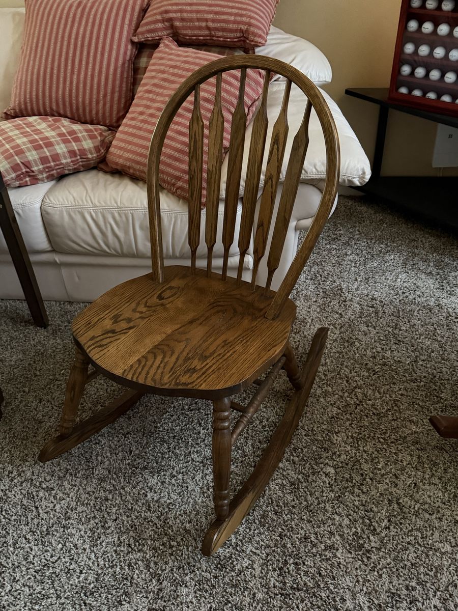 Very nice sturdy oak rocking chair.