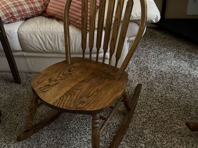 Very nice sturdy oak rocking chair.