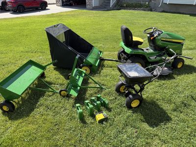 Sale Pending - John Deere X384 Lawn Tractor with Trailer, Sweeper, Dethatcher, Aerator, Spreader, weights, Bat charge