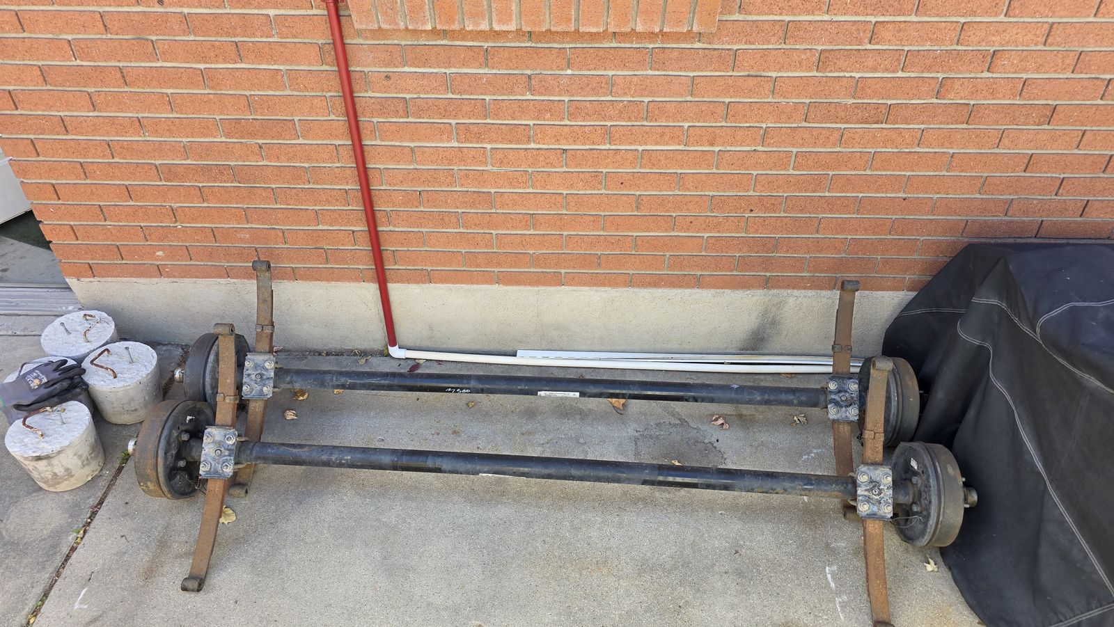 3500lbs axles - one bent, good for parts, one is in good shape