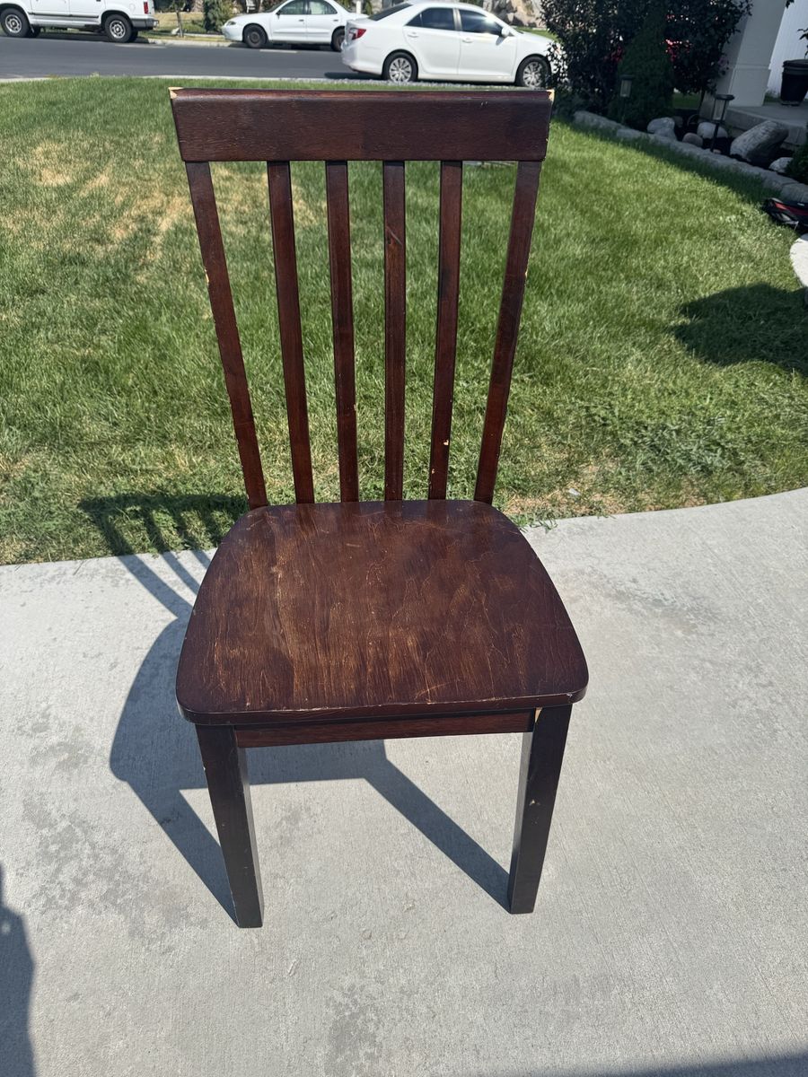 Vintage Dark Brown Wooden Dining Chair with Slat Back Design