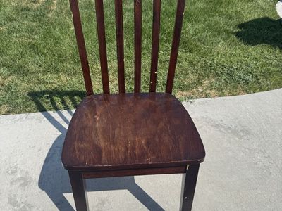 Vintage Dark Brown Wooden Dining Chair with Slat Back Design