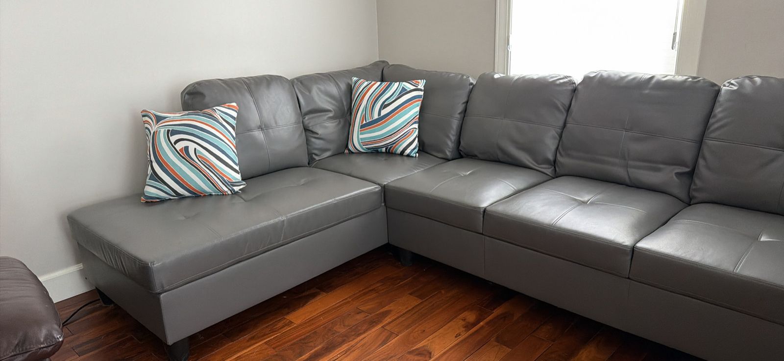 Gray L-Shaped Leather Sectional Sofa with Ottoman - Modern Design