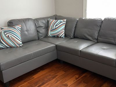 Gray L-Shaped Leather Sectional Sofa with Ottoman - Modern Design