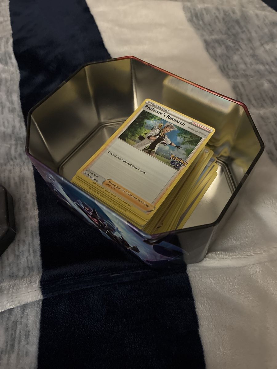 Full box of Pokémon trainer cards - (box included)