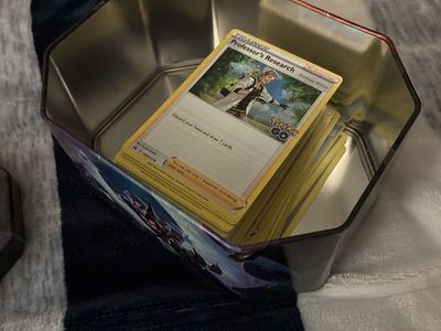 Full box of Pokémon trainer cards - (box included)