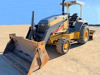 2016 John Deere 210l skip loader w/ 4 & 1 bucket & rear drag scraper