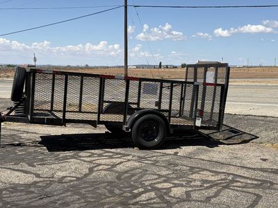 12 ft Utility Trailer with Drop Down Rear Ramp, Newer Axles, Springs & Spare Tire