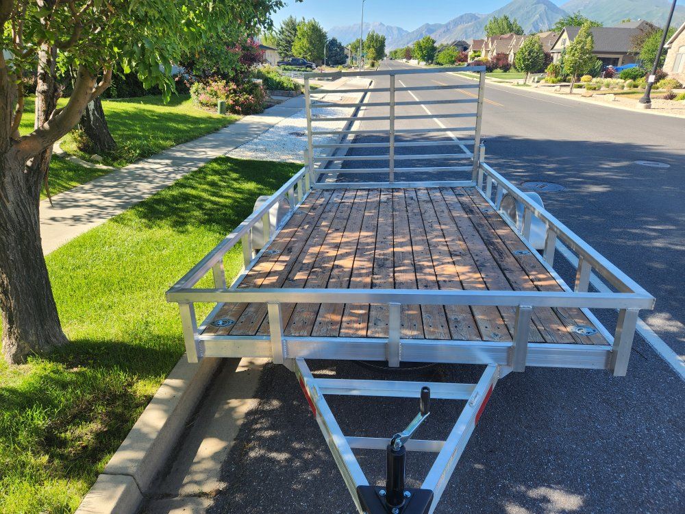 LikeNew Aluminum Trailer with Wood Deck - Perfect for Hauling and Utility.7'x12'.