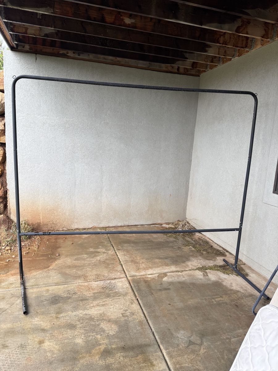 Outdoor movie screen and frame