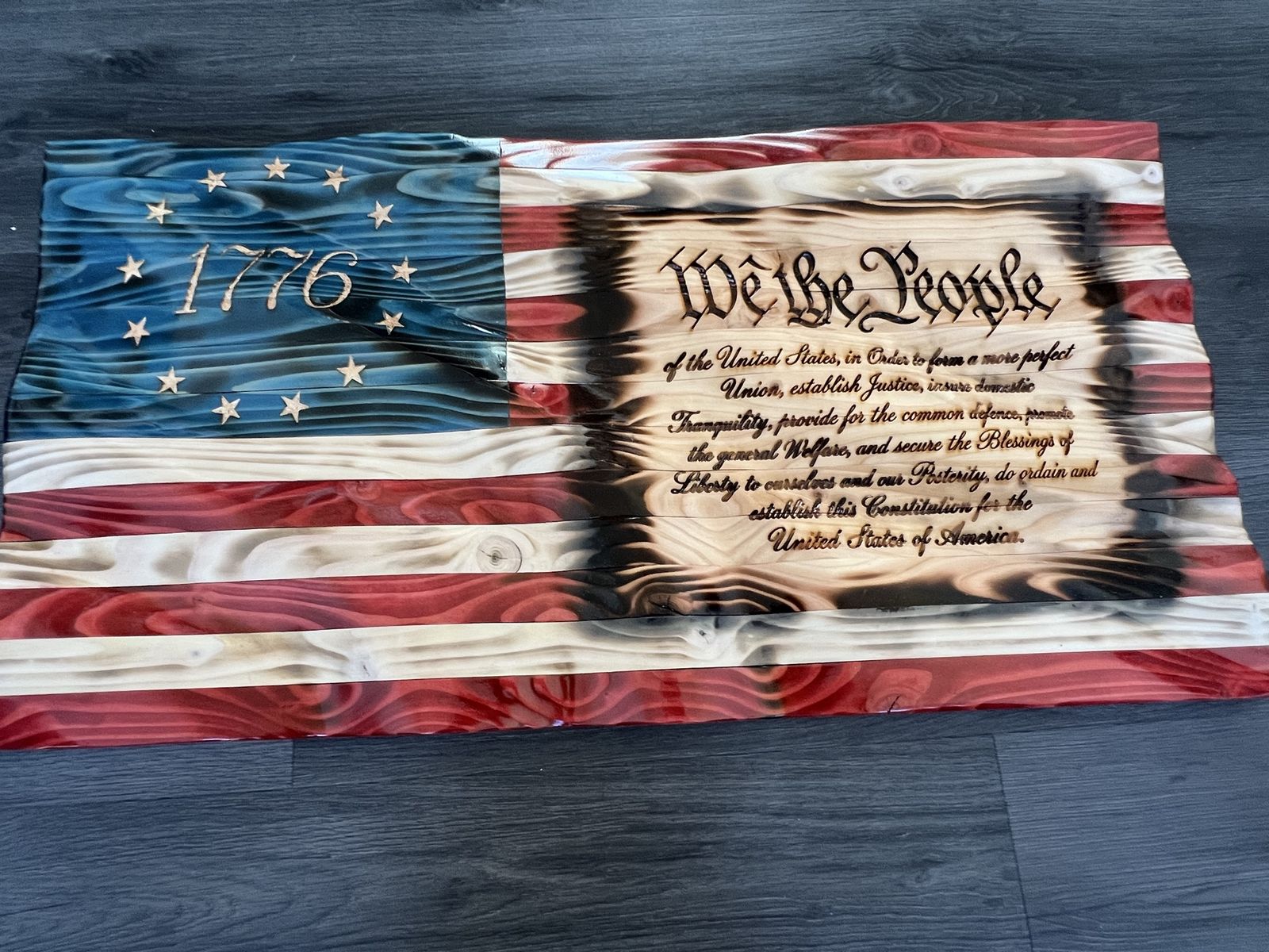 37x19.5x1.5 hand carved wavy wooden American flag with we the people 