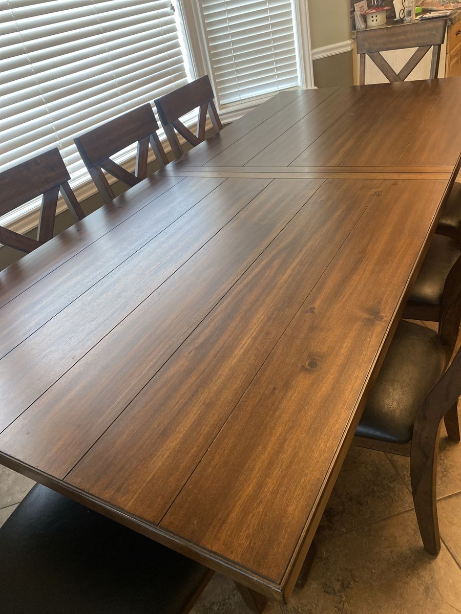 Wooden Dining Room Table Set with X-Back Chairs and Upholstered Seats. 85x42. Additional 18inch self storing leaf. $1100 OBO