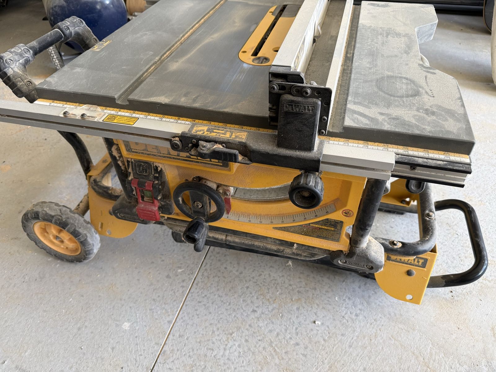 DeWalt 10” table saw with collapsible stand.