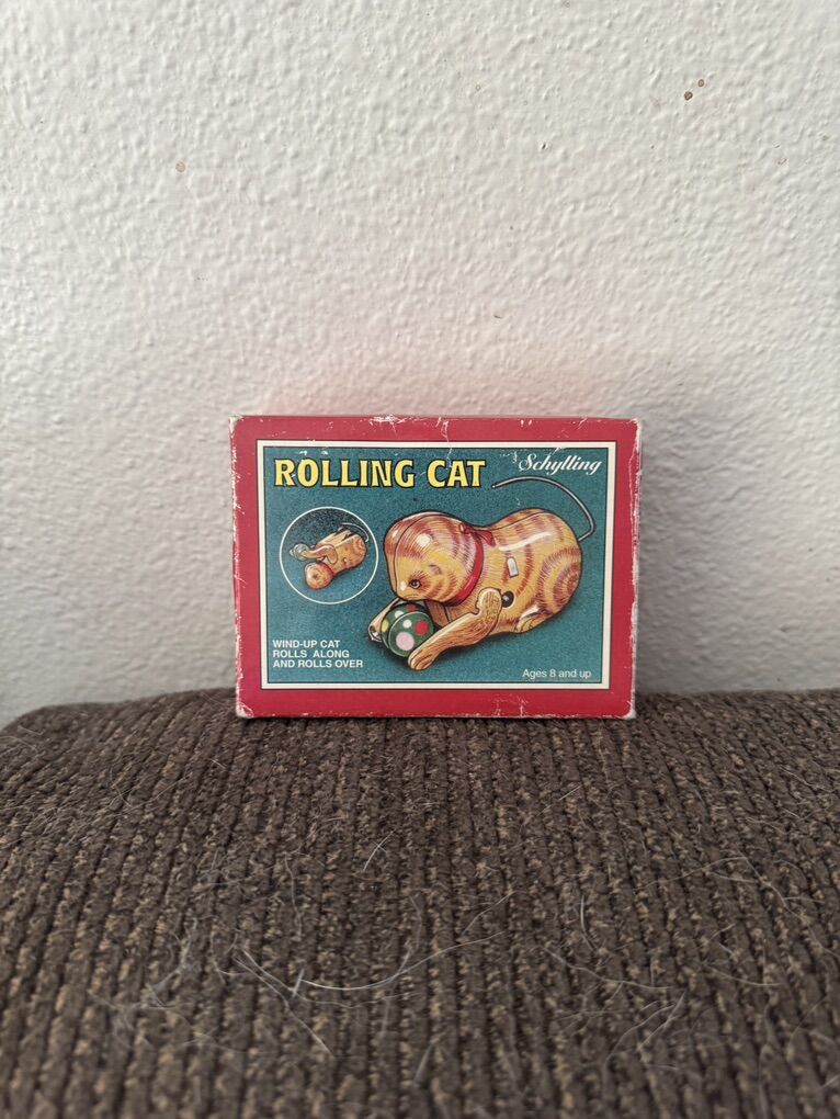 Schylling Wind-Up Rolling Cat tin toy