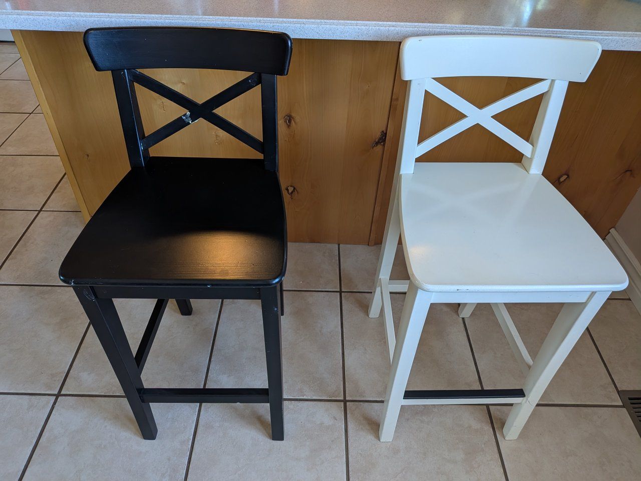 Pair of Bar Stools - Black and White X-Back Design Counter Height Chairs