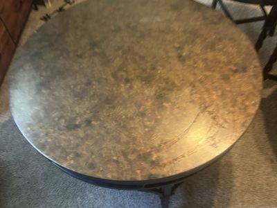 round coffee table and two end tables