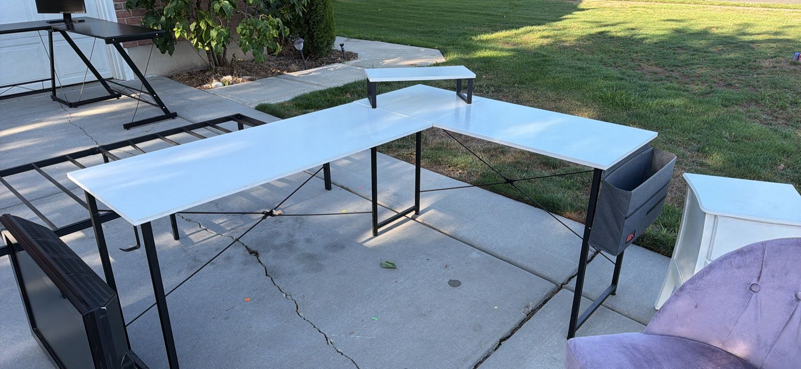 White and Black L-Shaped Computer Desk with Monitor Stand and Storage Pocket
