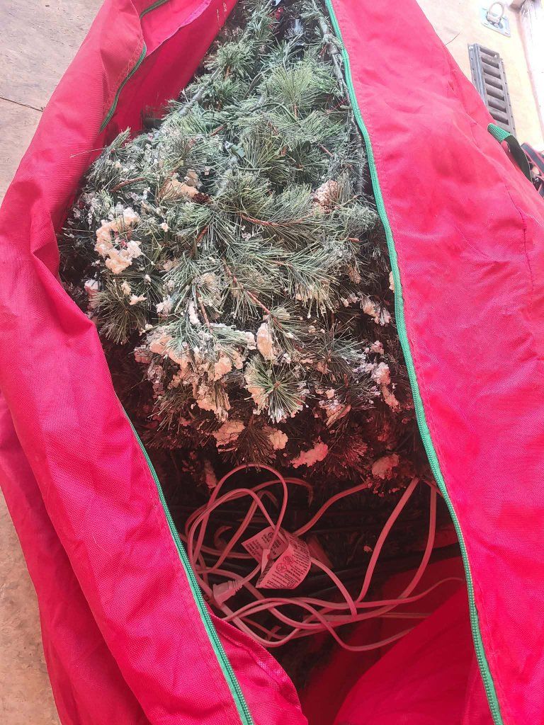 large frosted Christmas Tree, with wheeled bag