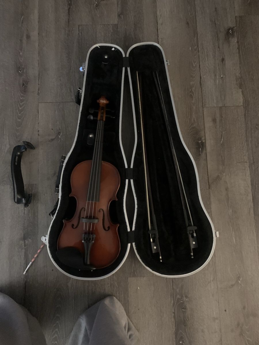 violin with two bows and a shoulder rest