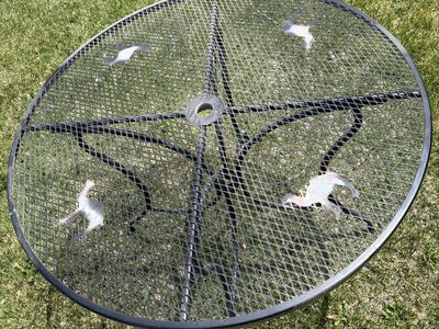 Round black camel metal mesh patio table