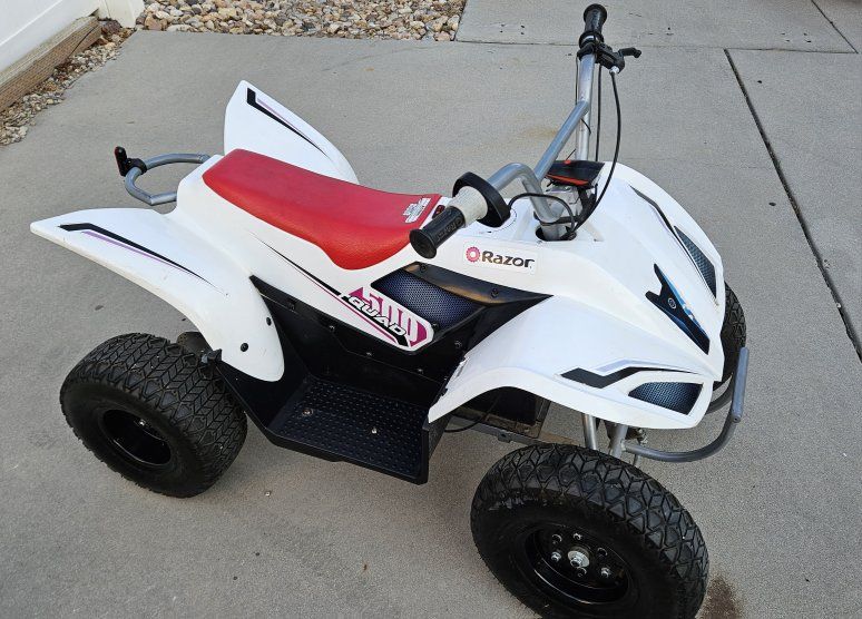 Razor Quad 500 36volts Electric new batteries come with a charger & lights & horn. $400 Firm.