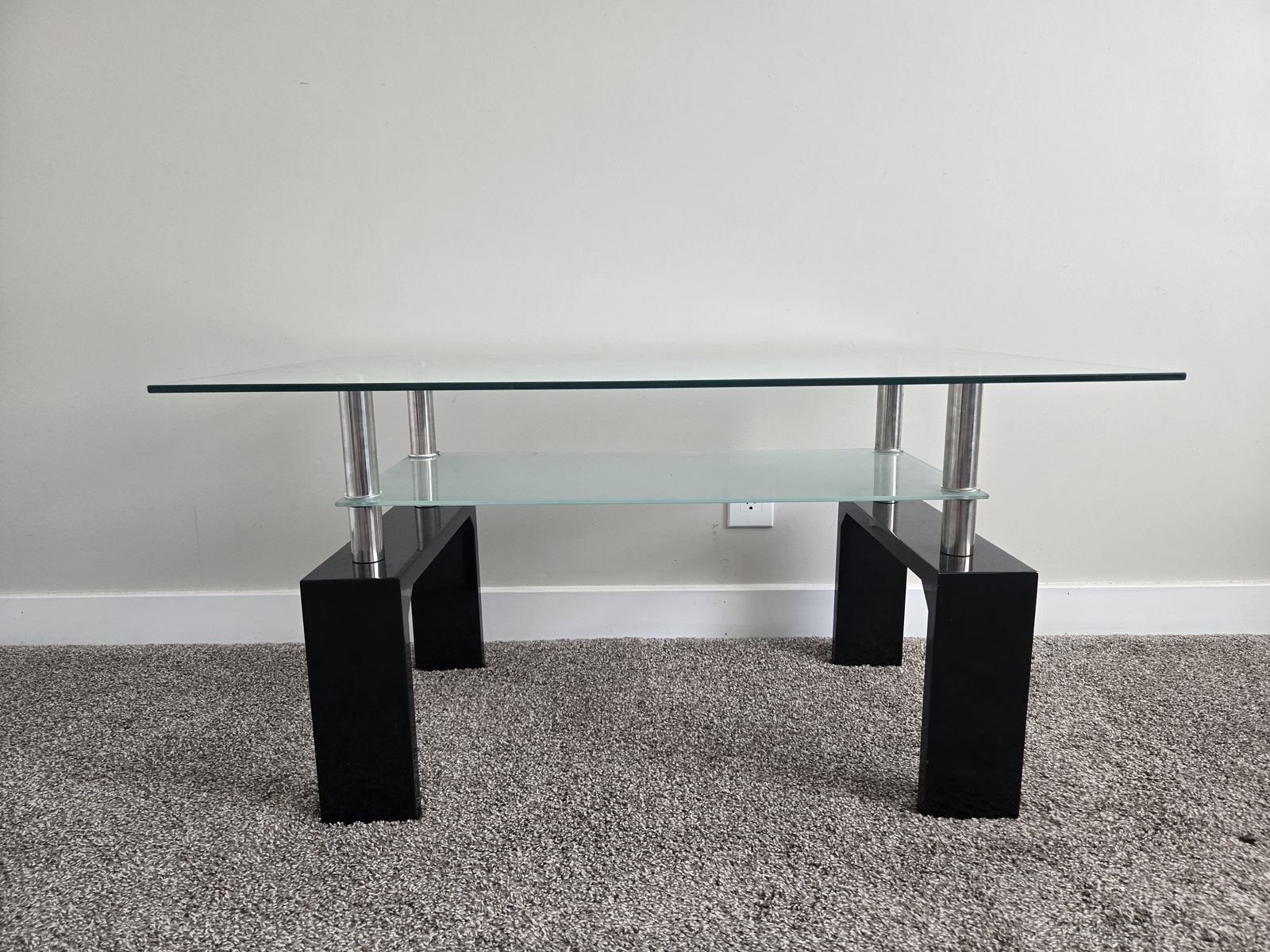 Modern Glass Top Coffee Table with Black Legs and Chrome Accents, Two-Tier Design