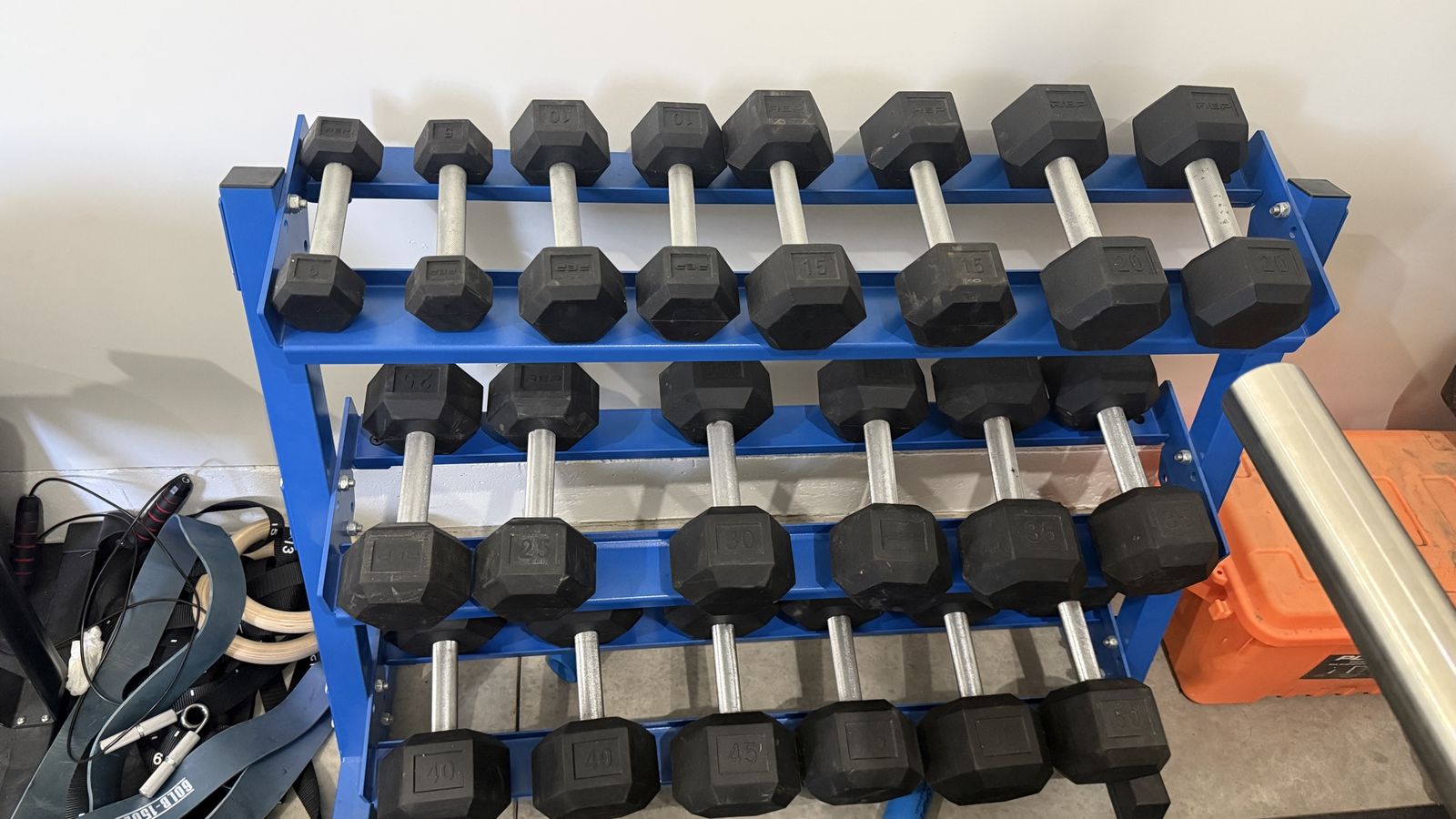Rep Fitness Dumbbell set. 5-50lbs & storage rack.