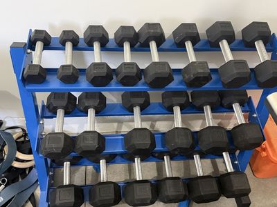 Rep Fitness Dumbbell set. 5-50lbs & storage rack.